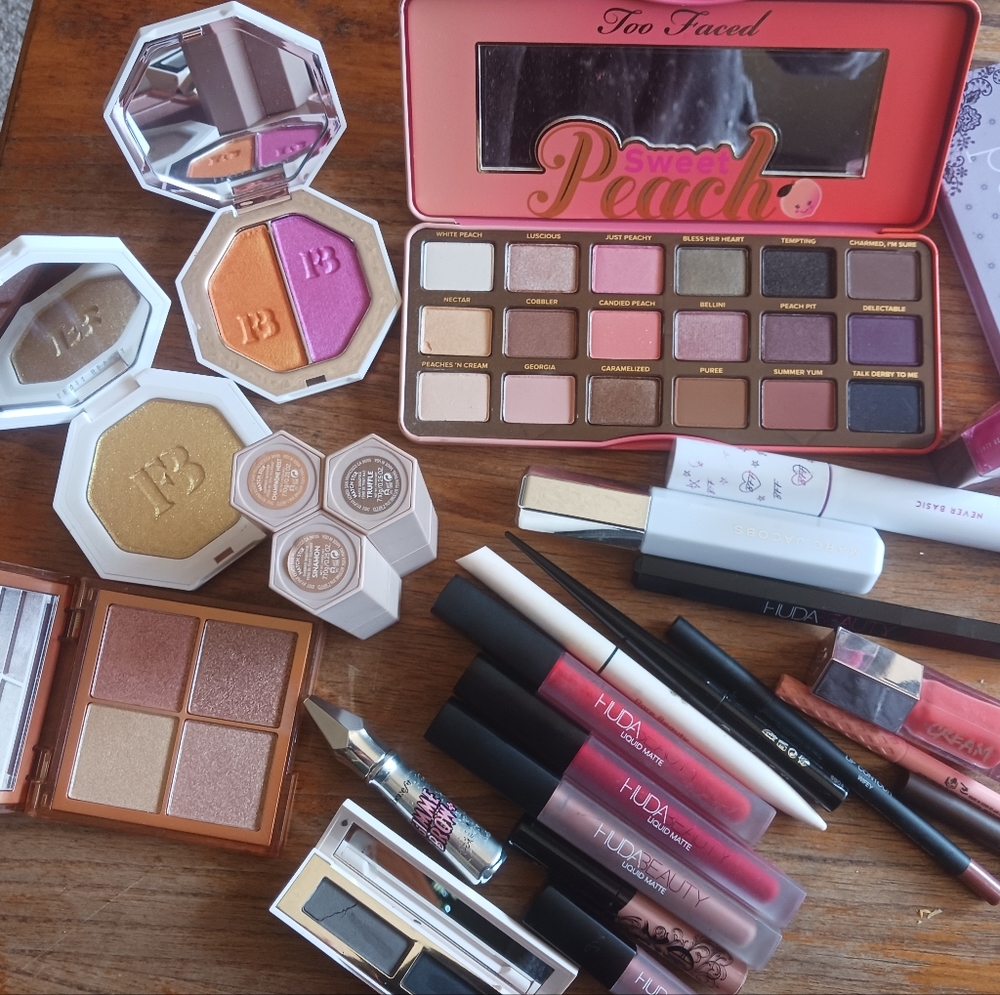 Fenty Highlighters new, huda highlighter new, too face peach eye shadow, grabbag